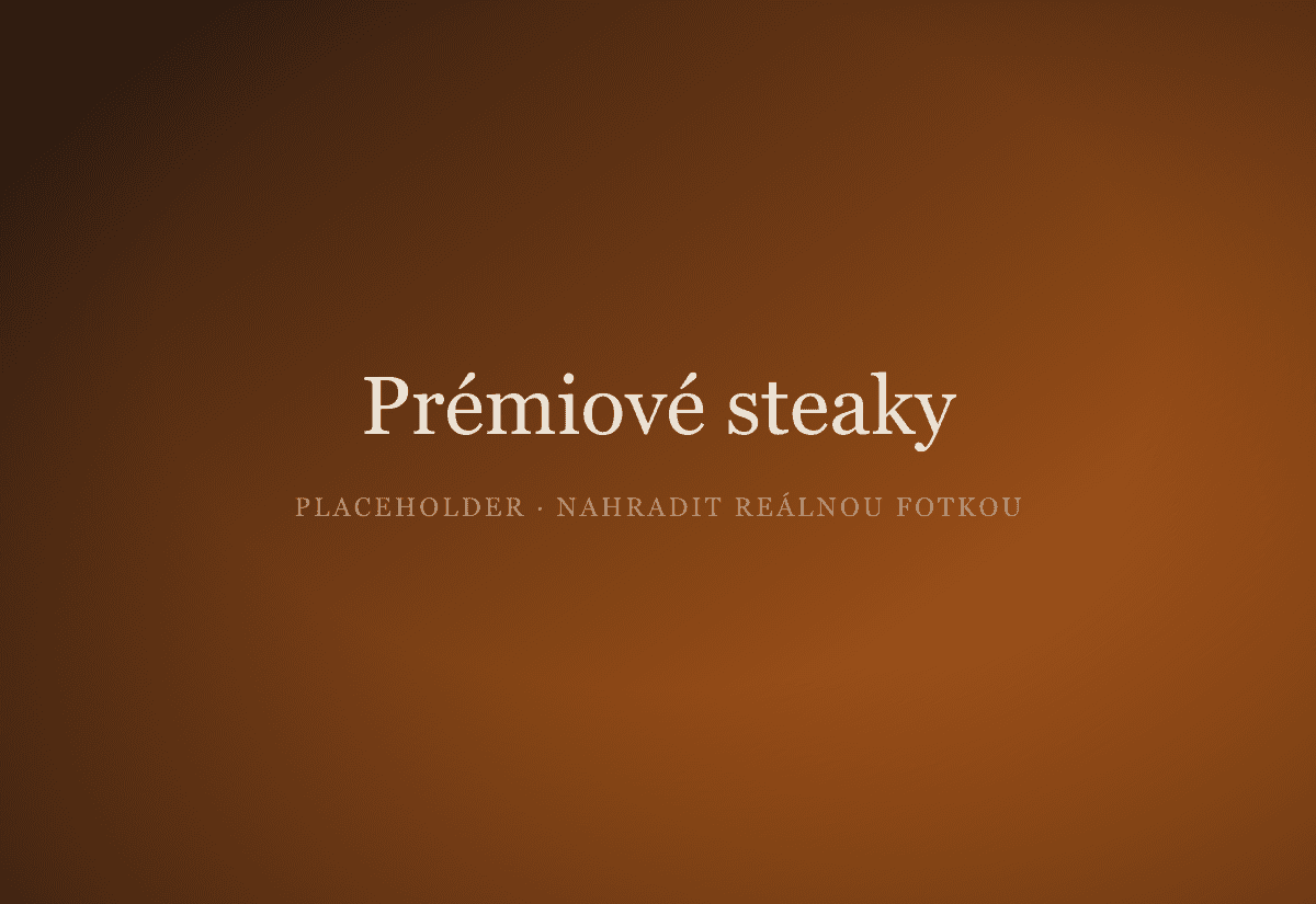 Grilovaný steak Rib Eye s rozmarýnem na dřevěném prkénku